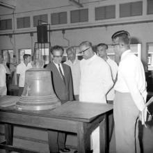 Education Minister of Madras State Mr. V. R. Nedunchezhiyan looks, in 1967, at a bell cast at the foundry of the IIT Madras workshop as Director Prof. B. Sengupto and Prof. R. G. Narayanamurthi look on