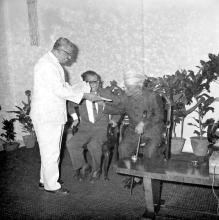 Mr. V. R. Nedunchezhiyan, Minister for Education, presents a copy of the Journal of Mathematical and Physical Sciences to Dr. A. L. Mudaliar as Director Prof. B. Sengupto looks on, 1967