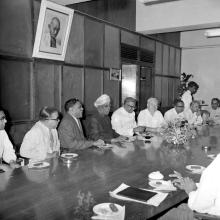 Mr. V. R. Nedunchezhiyan enjoys a lighter moment over tea with Dr. A. L. Mudaliar, Prof. W. Koch, and Mr. C. V. Sethunathan, 1967