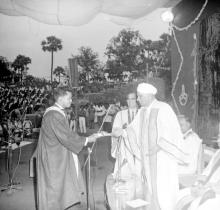 Mr. Lionel Paul receives the Governor's Prize from Sir C. V. Raman
