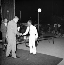 Dr. Karl Pfauter giving away a prize at the Ninth Institute Day celebrations at the Open Air Theatre, 1968