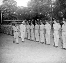 Sir C.V. Raman, escorted by Prof. Rayudu (NCC commander, Department of Mechanical Engineering), inspects the Guard of Honour