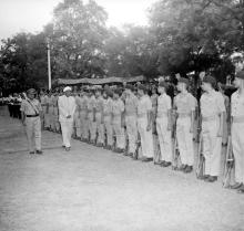 Sir C. V. Raman inspects the guard of honour along with 2/Lt. G. V. N. Rayudu