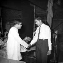 Mr. C. Subramaniam gives away a prize to Mr. Anand Singh Bawa, 1961