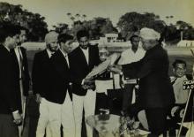 Dr. A. L. Mudaliar awards a trophy shield at the Third Inter-IIT Sports Meet, 1964