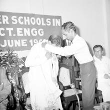 Dr. M. Karunanidhi honoured with a garland. Also seen, Prof. Sampath