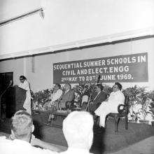 Dr. M. Karunanidhi addressing the audience. Also seen Dr. Karl Pfauter, Prof. A. Ramachandran and Prof. Sampath.