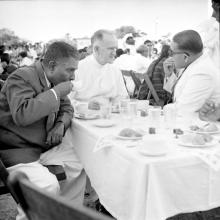 Distinguished guests at the table during high tea, 1961