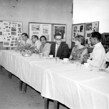 Guests at a table during high tea, 1961