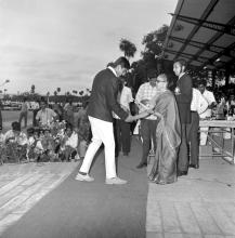 Mrs. Iengar gives away a prize at the Eighth Inter-IIT Sports Meet, 1970