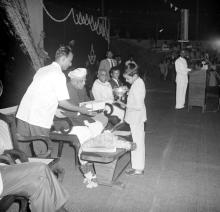 Dr. A. L. Mudaliar giving away a prize, 1966