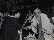 Mr. Basu John Vetteth receives the Governor's Prize for the year 1965 from Mr. M. C. Chagla 