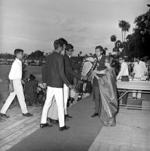 Mrs. Iengar awards a trophy shield at the Eighth Inter-IIT Sports Meet held in IIT Madras, 1970