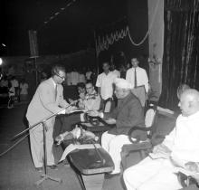 Prof. B. Sengupto giving the Annual Number to Dr. A. L. Mudaliar, 1966