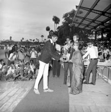 Mrs. Iengar presents a trophy at the Eighth Inter-IIT Sports Meet, 1970