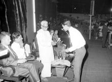 Mr. M. Bhaktavatsalam presents a prize to a student during the Sixth Institute Day, 1965