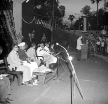 Dr. N. Klein delivering his speech titled 'Carry on Regardless', 1966