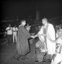 A student receives an award from Mr. H. V. R. Iengar (Chairman, Board of Governors)