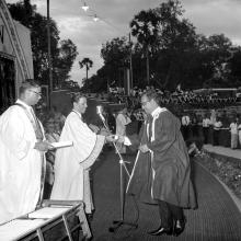 Dr. A. Ramachandran confers a degree to a graduate