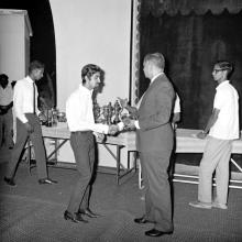 Mr. H. V. R. Iengar presents a trophy to a student during the Tenth Institute Day, 1969