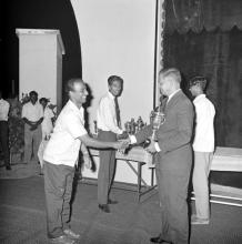Mr. H. V. R. Iengar presents a trophy to Mr. Srinivasan during the Tenth Institute Day, 1969