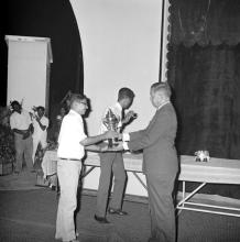 Mr. H. V. R. Iengar presents a trophy to a student during the Tenth Institute Day, 1969