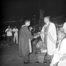 A student receives an award from Mr. H. V. R. Iengar (Chairman, Board of Governors)