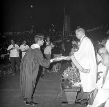 A student receives an award from Mr. H. V. R. Iengar (Chairman, Board of Governors)