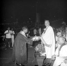 A student receives an award from Mr. H. V. R. Iengar (Chairman, Board of Governors)