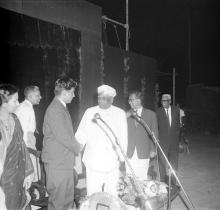 Mr. R. Natarajan and Dr. A. L. Mudaliar greet each other at Mr. R. Natarajan’s farewell ceremony
