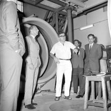 Prof. Armin Klein addresses the group at a wind tunnel in the Applied Mechanics Department, 1969