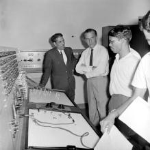 Prof. A. Ramachandran and Mr. J. R. D. Tata in discussion at the DC Network Analyser, 1969