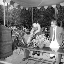 Children honouring the dignitaries with garlands at the opening of the Central Library