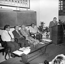 A gentleman addresses the audience during the symposium on Introduction of SI system