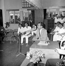 The judge of the quiz event (probably) at the annual Literary and Cultural Week addresses the participants