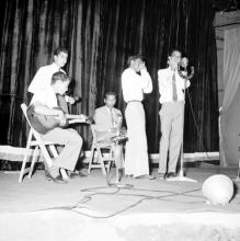 The students perform a musical piece at the Third Institute Day