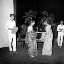 A student receiving a prize from Mrs. Sushila Ramachandran (Director’s wife) at the annual Literary and Cultural Week