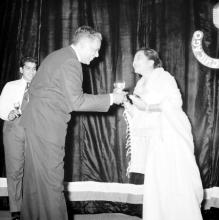 Mrs. Shanti Sengupto (Director’s wife) hands over  a prize to Mr. Y. S. Ramaswamy (Superintending Engineer)