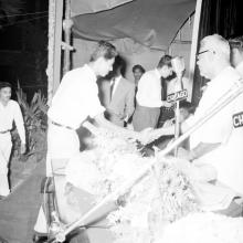 Dr. P. Subbarayan hands over a prize to a student