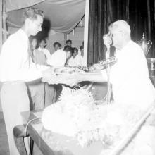 Dr. P. Subbarayan (Union Minister of Transport and Communications) hands over a prize to Mr. Ram Prakash Shetty.