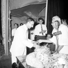 Dr. P. Subbarayan (Union Minister of Transport and Communications) hands over a prize to Prof. E. G. Ramachandran
