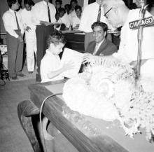 A sentimental moment: Dr. P. Subbarayan (Union Minister of Transport and Communications) gives a prize to a child