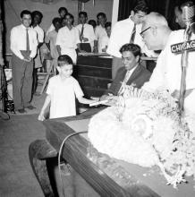 A sentimental moment: Dr. P. Subbarayan (Union Minister of Transport and Communications) gives a prize to a child