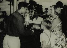 Mrs. Ann Lohmann Fischer gives away a trophy to a student at the first Inter-Collegiate Sports Meet, 1964