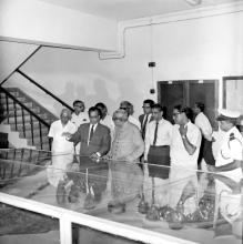 Prof. B. Sengupto (Director) uses a 3D model of the campus to explain the development of IIT Madras to Mr. M. C. Chagla (Union Minister for Education, New Delhi) during his visit to the Institute
