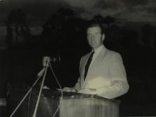 Mr. Gerhard Fischer addresses the audience at the first Inter-Collegiate Sports Meet, 1964