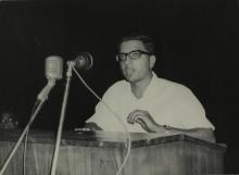 A student addresses the audience at the first Inter-Collegiate Sports Meet, 1964