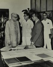 Mr. M. C. Chagla discusses research reports with Prof. B. Sengupto