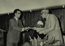 Prof. B. Sengupto presents a cheque towards the National Defence Fund to Mr. M. C. Chagla at a formal event held on the occasion of his visit to the Institute 