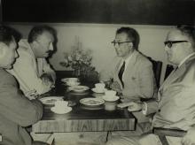 A sub-committee of the Federal German Parliament in conversation with Prof. B. Sengupto over refreshments